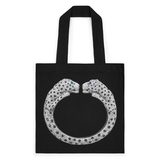A black tote bag featuring Cartier's twin-headed diamond panther bangle.