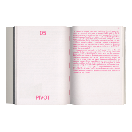 A book spread with pink text.